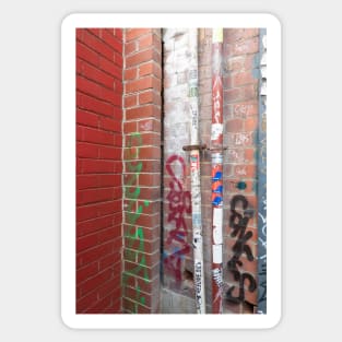 Graffiti on brick wall, Melbourne Lane. Sticker